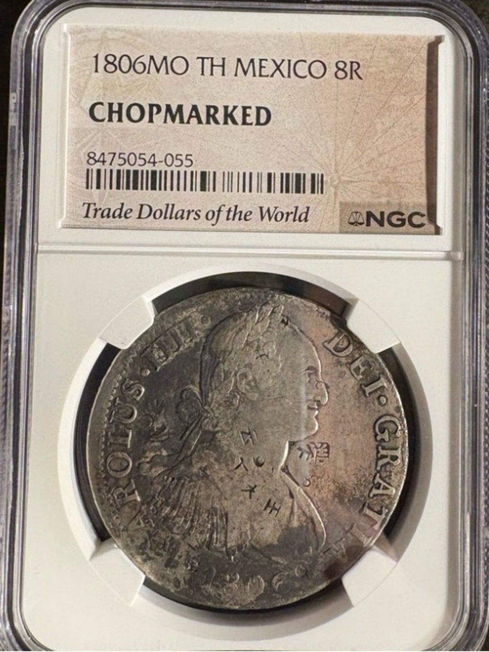 Certified Silver Coin in Protective NGC Holder - Silver Tone